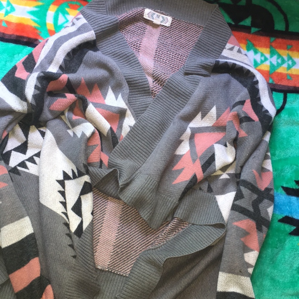 Over shirt cardigan type sweater.